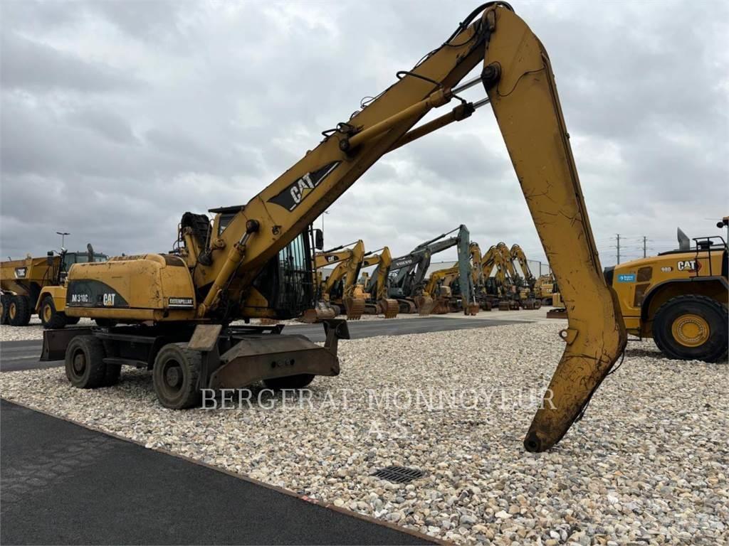 CAT M318C Gravemaskiner på hjul
