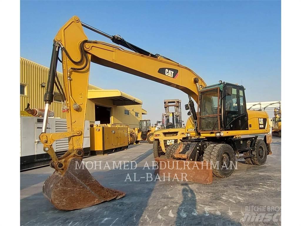 CAT M320D2 Gravemaskiner på hjul