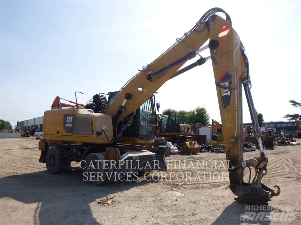 CAT MH3022-06 Gravemaskiner på hjul
