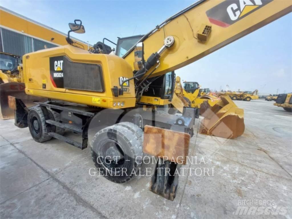 CAT MH3024 Gravemaskiner på hjul