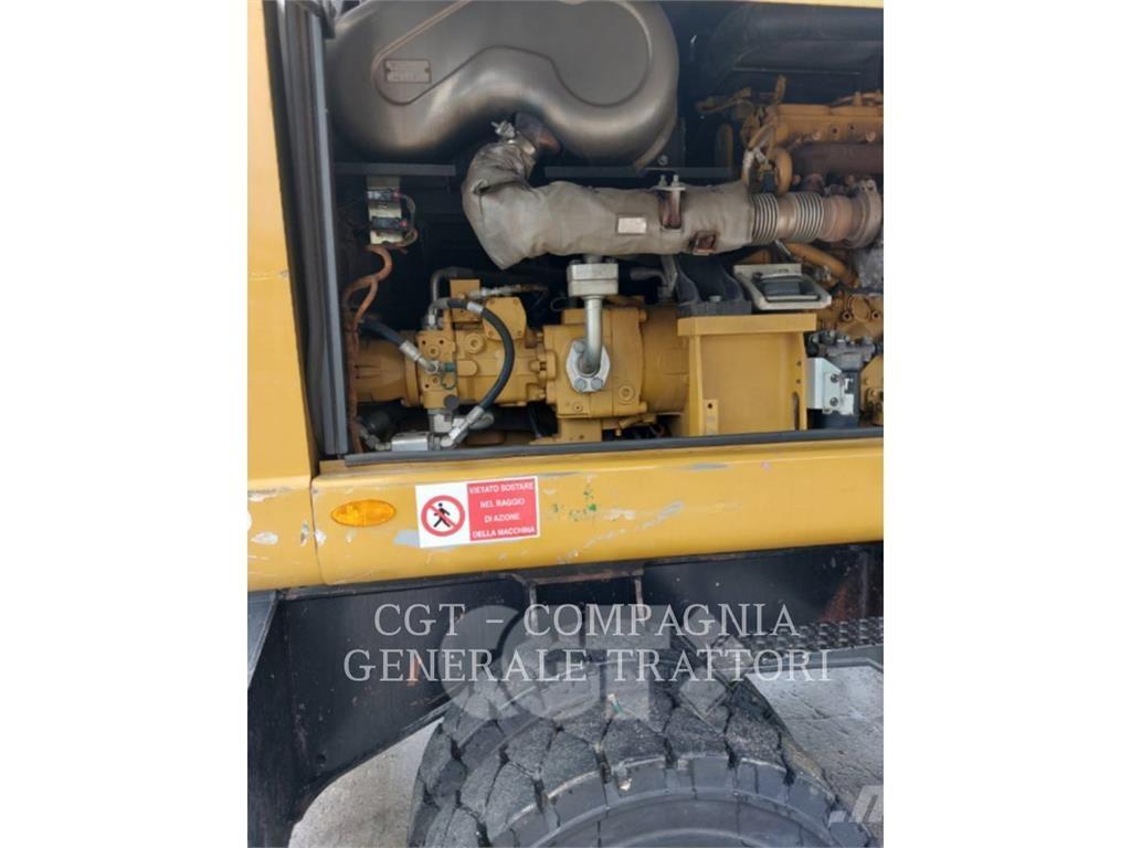 CAT MH3024 Gravemaskiner på hjul