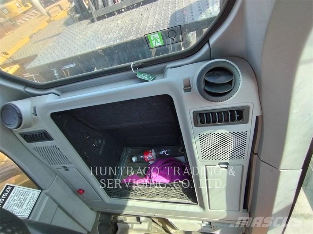 CAT MH3024-07 Gravemaskiner på hjul