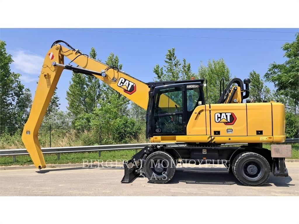 CAT MH3024-1 Gravemaskiner på hjul