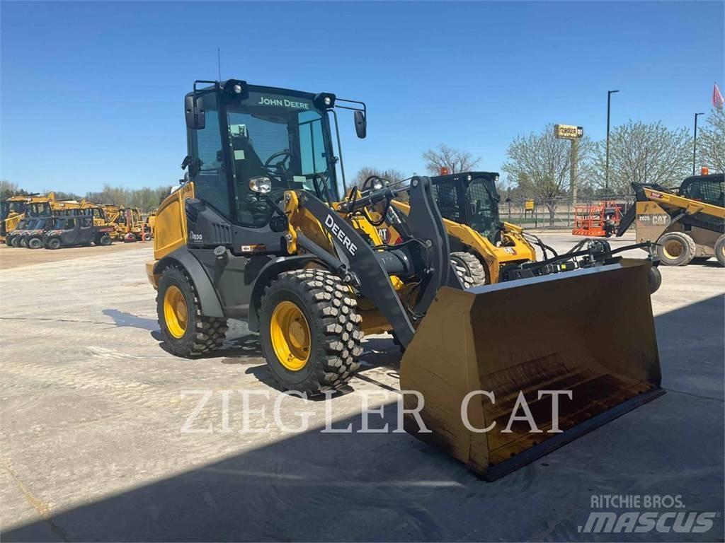 John Deere & CO. 244L Læssemaskiner på hjul