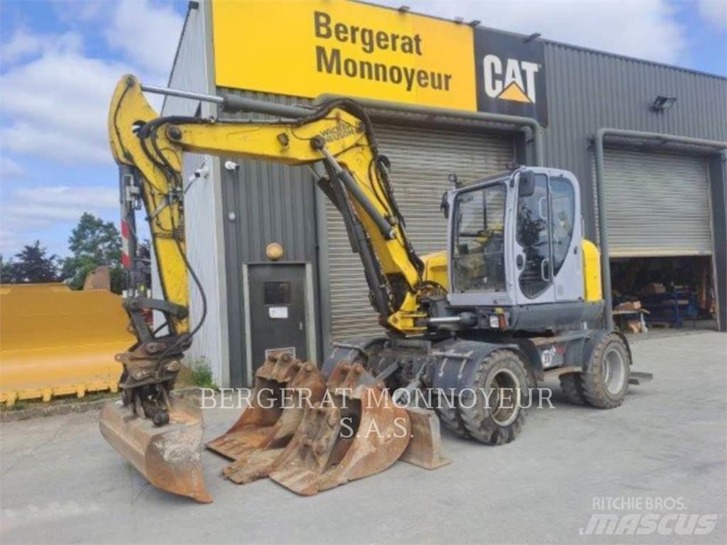 Neuson EW100 Gravemaskiner på hjul
