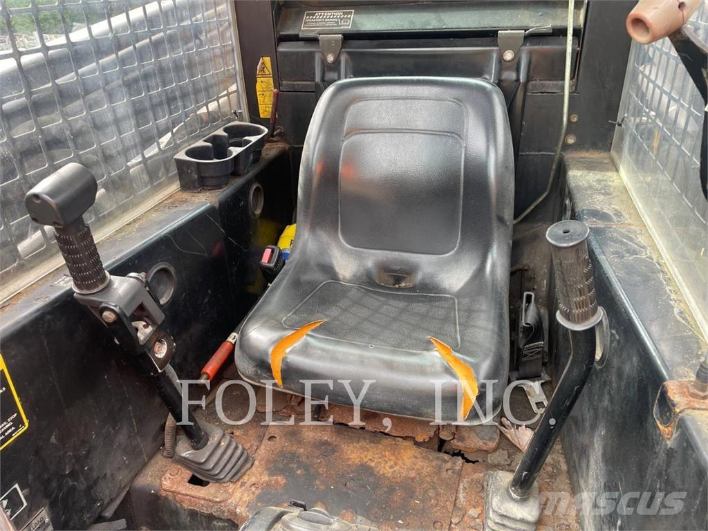 New Holland LX885 Minilæsser - skridstyret