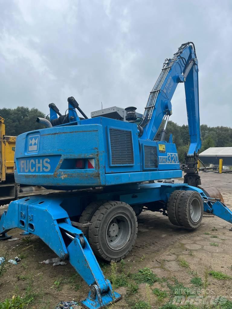Fuchs MHL 320 Gravemaskiner på hjul