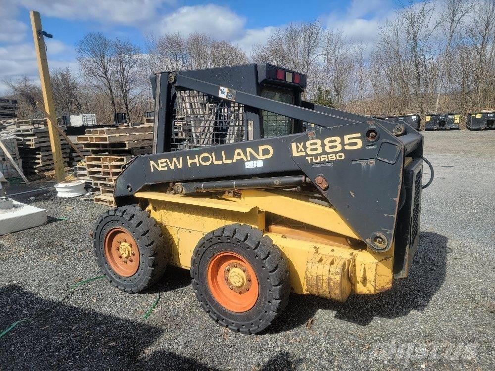 New Holland LX 885 Minilæsser - skridstyret
