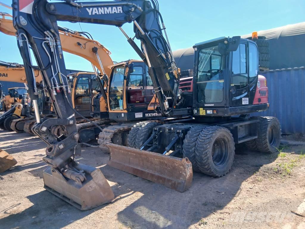 Yanmar B 110 W Gravemaskiner på hjul