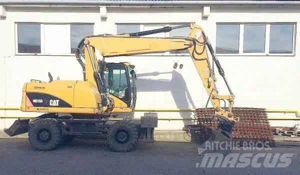 CAT M 315 D Gravemaskiner på hjul