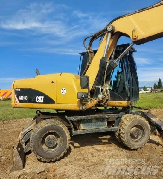 CAT M318 D Gravemaskiner på hjul
