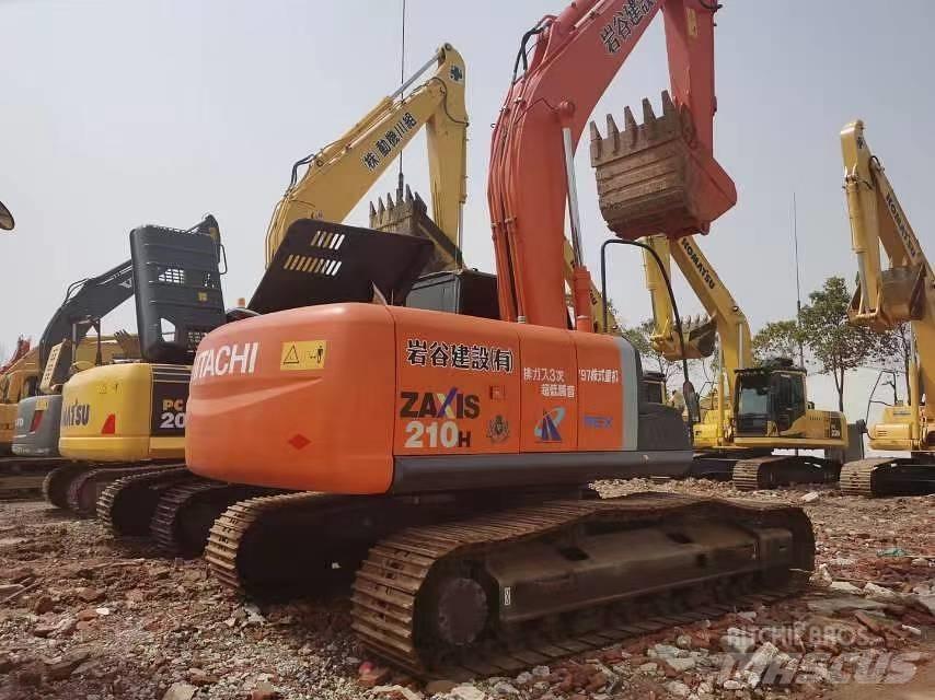 Hitachi ZX 210 Gravemaskiner på larvebånd