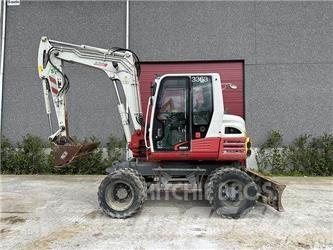 Takeuchi TB295W Gravemaskiner på hjul