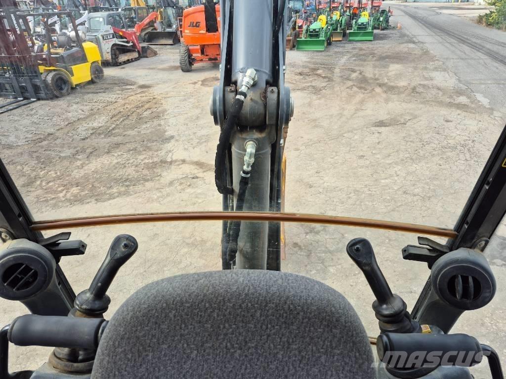 John Deere 310 Rendegravere