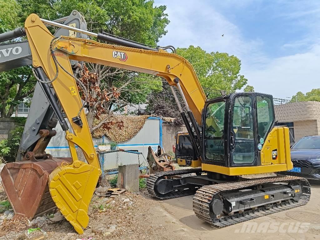 CAT 310 Gravemaskiner på larvebånd