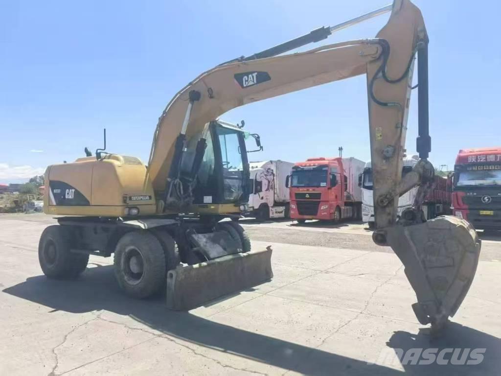 CAT M315D2 Gravemaskiner på hjul