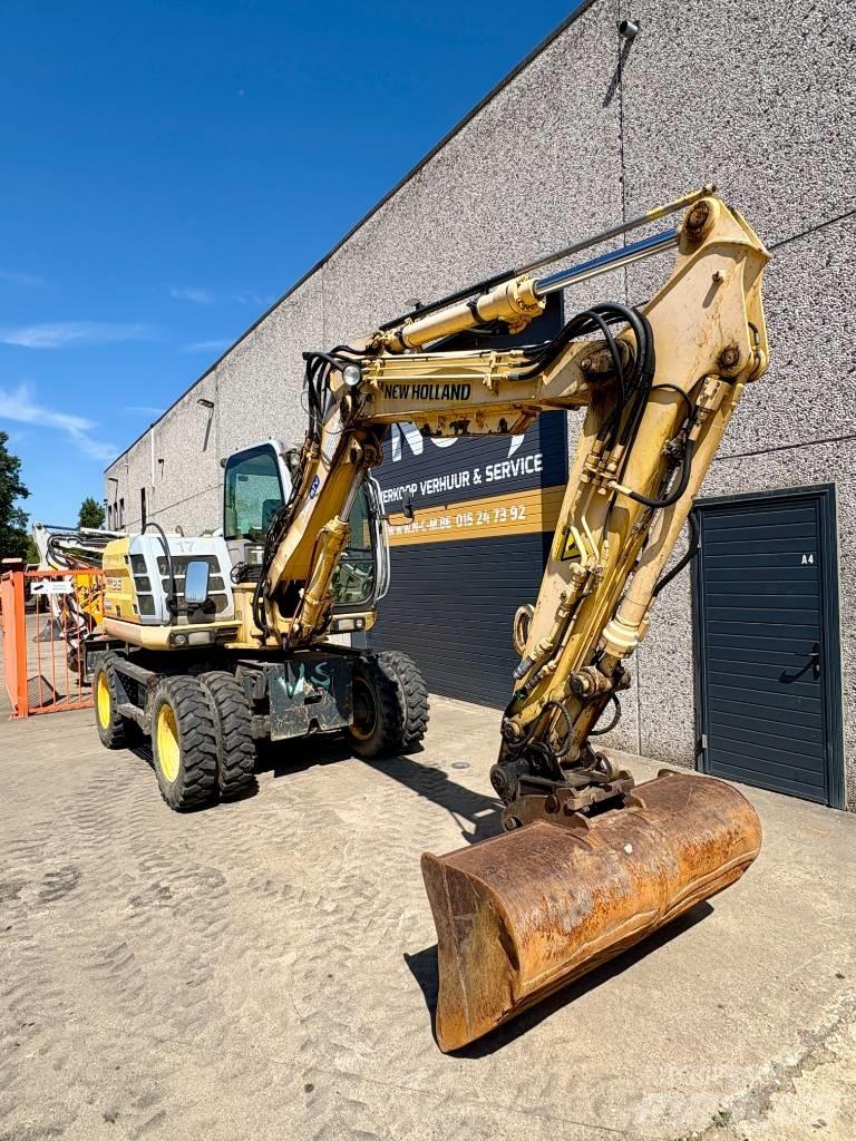 New Holland MH 2.6 Gravemaskiner på hjul