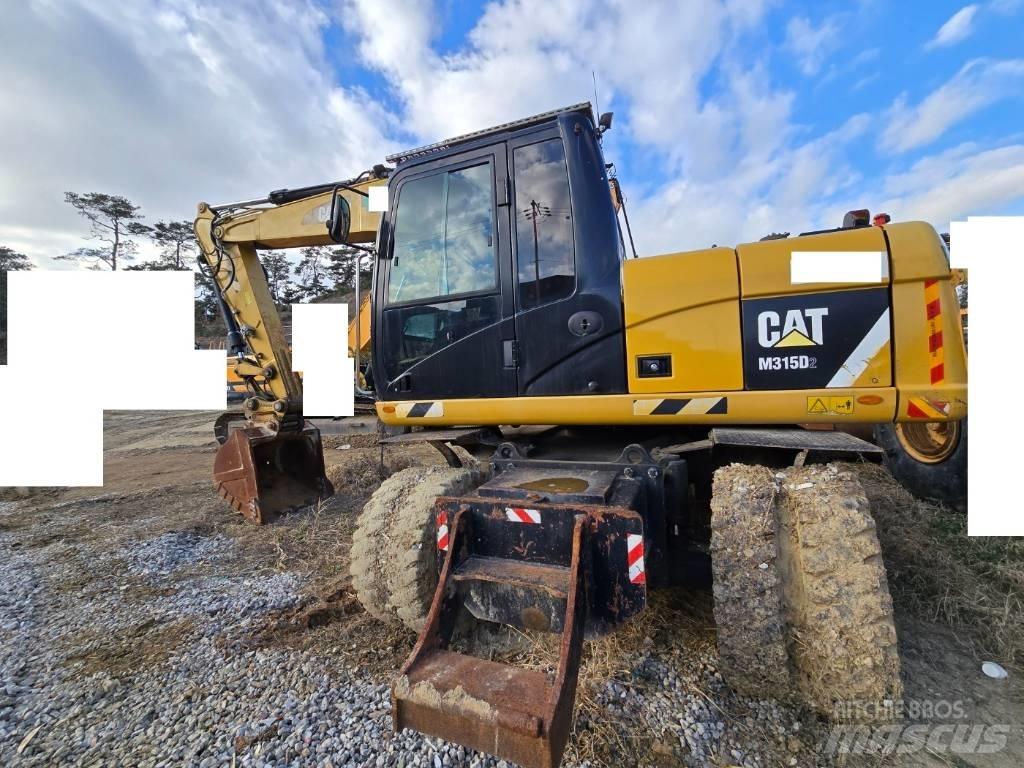 CAT M 315 D Gravemaskiner på hjul