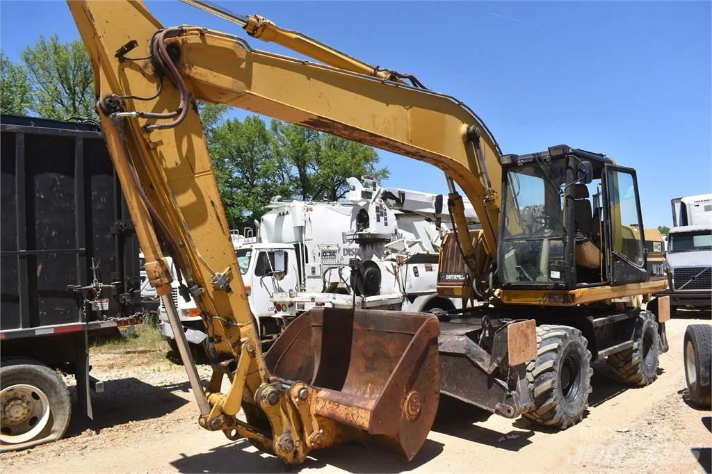 CAT M318 Gravemaskiner på hjul