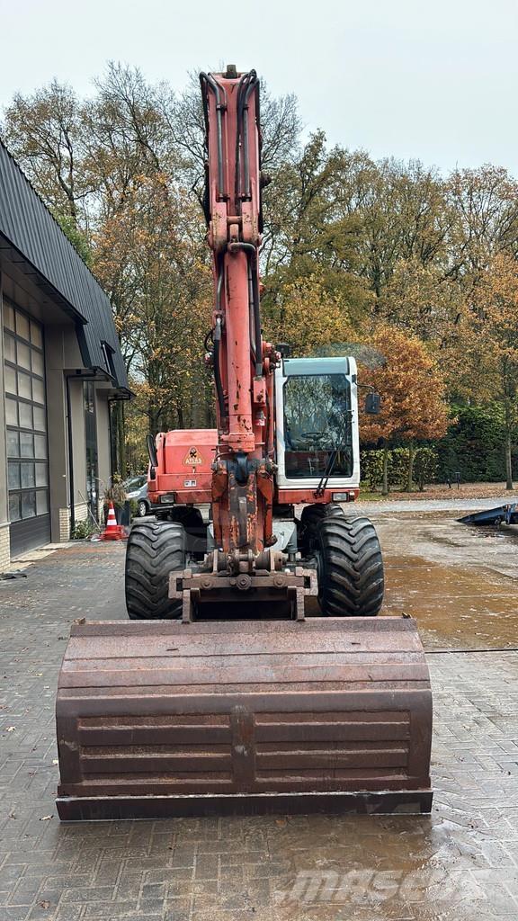 Atlas 1304 Gravemaskiner på hjul