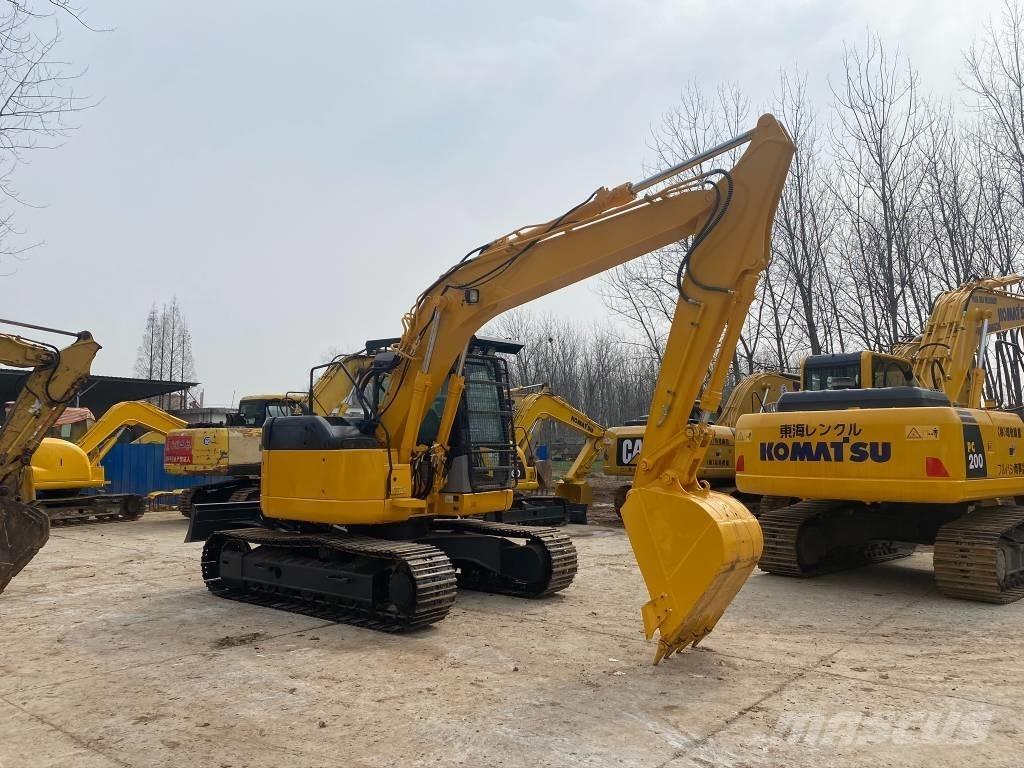 Komatsu PC128US Gravemaskiner på larvebånd