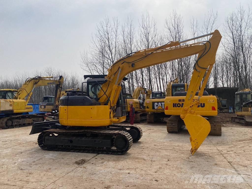 Komatsu PC128US Gravemaskiner på larvebånd