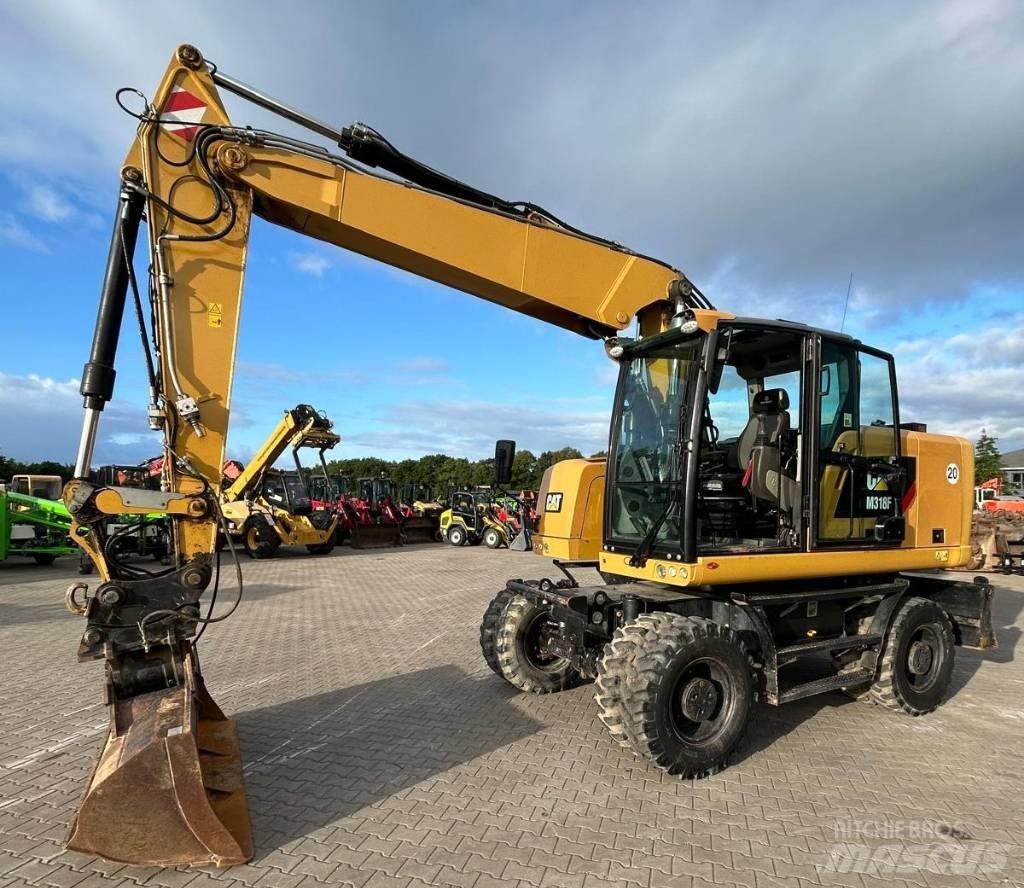 CAT M 318 F Gravemaskiner på hjul