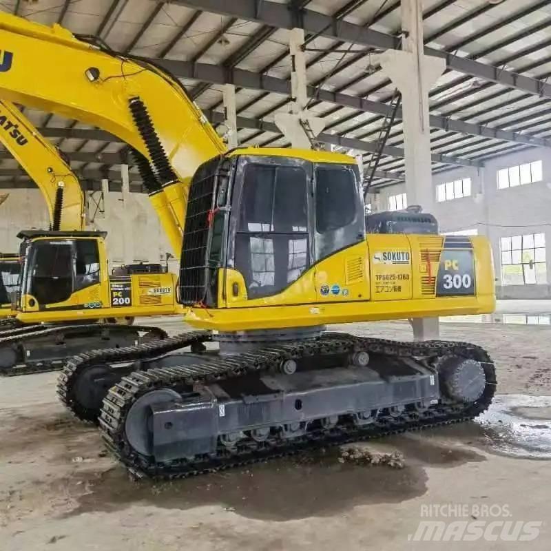 Komatsu PC300-7 Gravemaskiner på larvebånd
