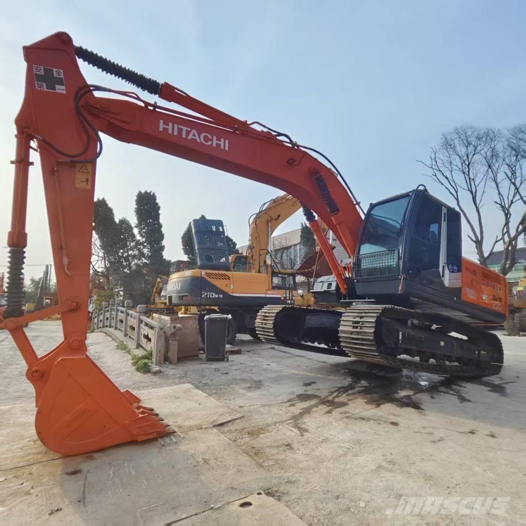 Hitachi ZX 210 Gravemaskiner på larvebånd