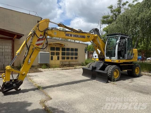 New Holland WE 170 C Gravemaskiner på hjul