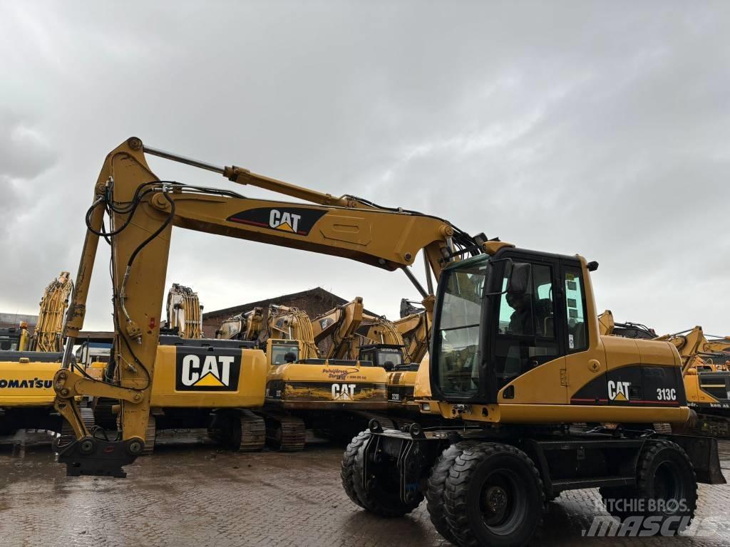 CAT M 313 C Gravemaskiner på hjul