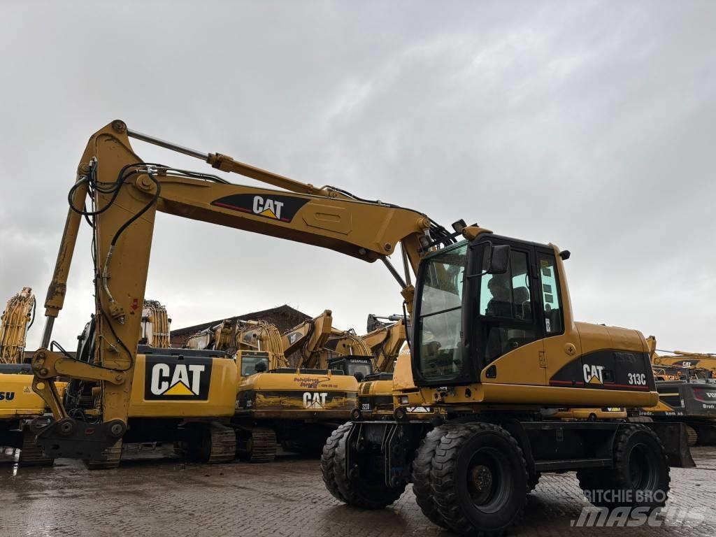 CAT M 313 C Gravemaskiner på hjul