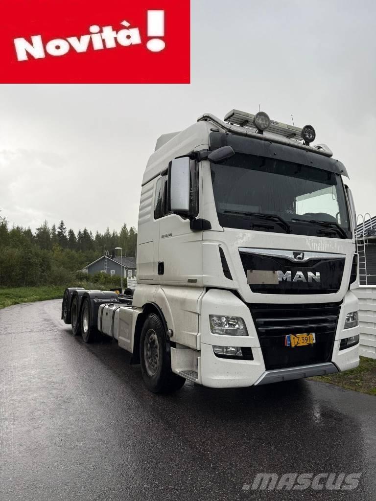 MAN TGX 32.580 Flatbed lastbiler med spil