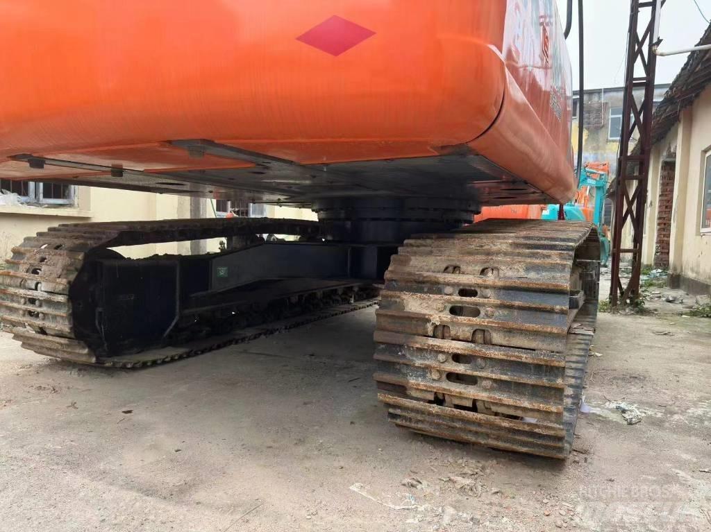 Hitachi ZX 210 Gravemaskiner på larvebånd