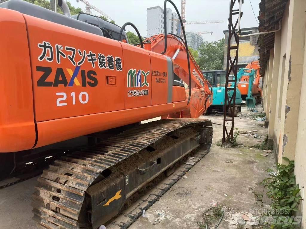 Hitachi ZX 210 Gravemaskiner på larvebånd