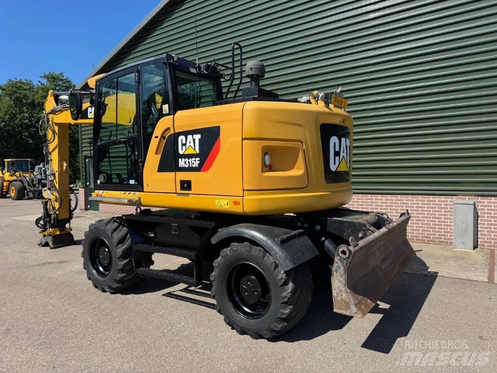 CAT M 315 F Gravemaskiner på hjul