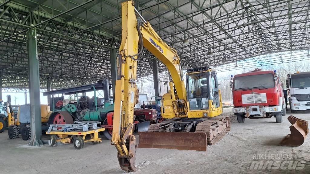 Komatsu 138US-8 Gravemaskiner på larvebånd