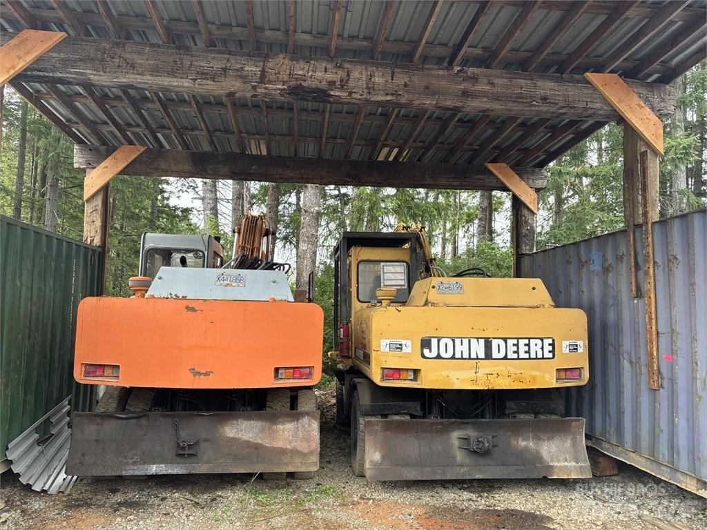DEERE 595D Gravemaskiner på hjul