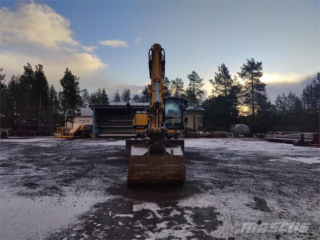 CAT M315 Gravemaskiner på hjul