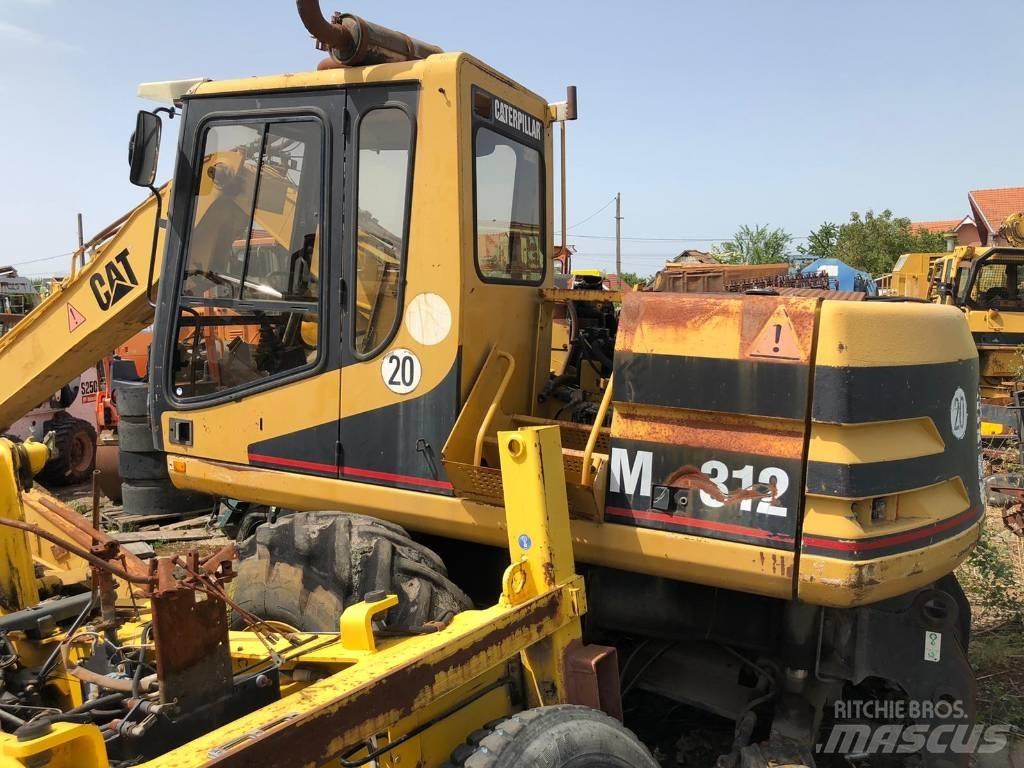CAT M 312 FOR PARTS Gravemaskiner på hjul