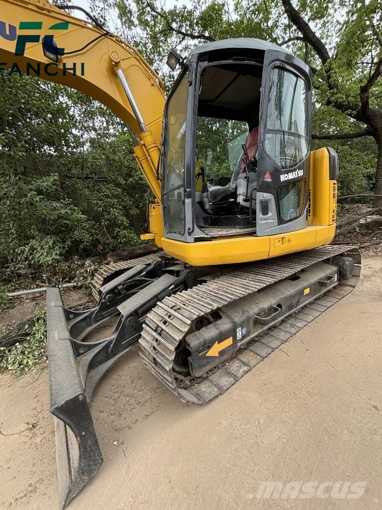Komatsu PC128US Gravemaskiner på larvebånd