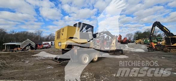 CAT 559C Knuckleboom læssere