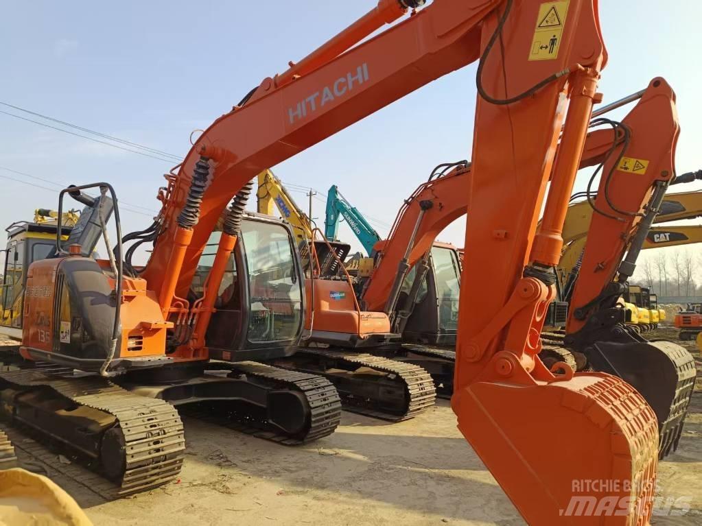 Hitachi ZX135 Gravemaskiner på larvebånd
