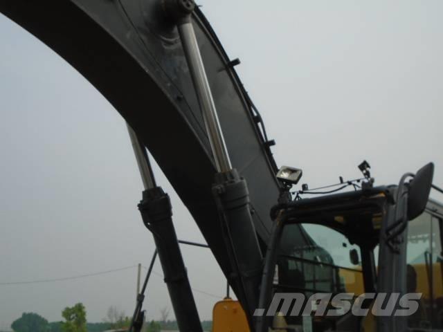 John Deere 450 DLC Gravemaskiner på larvebånd