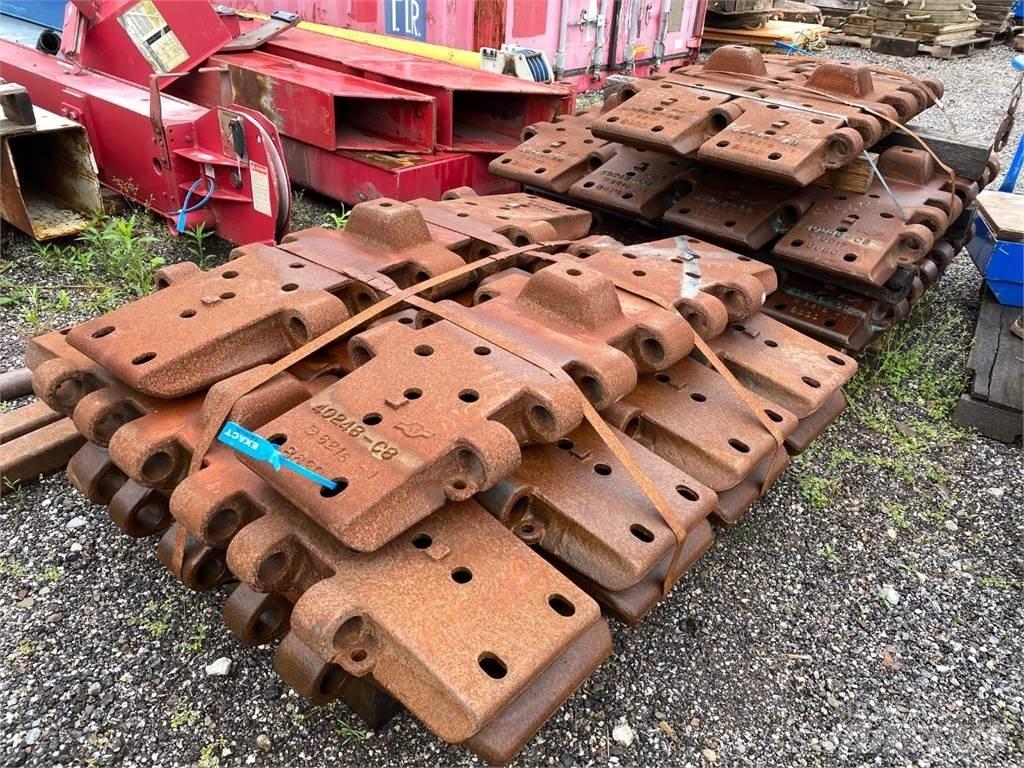 Manitowoc  Bånd, kæder og understel