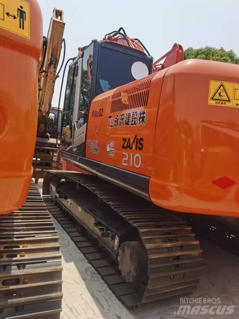 Hitachi ZX 210 Gravemaskiner på larvebånd