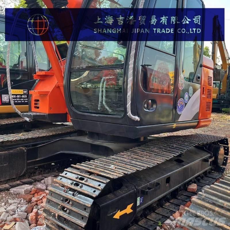 Hitachi ZX 135 Gravemaskiner på larvebånd