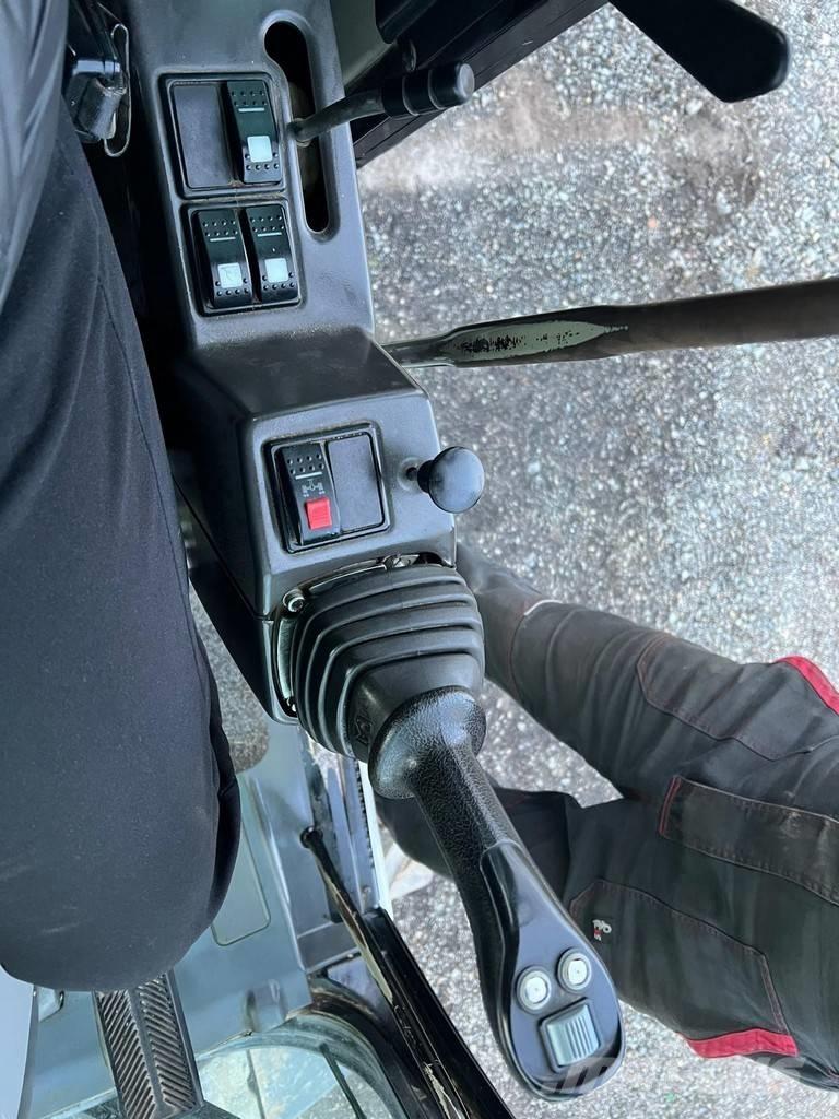 CAT M 313 D Gravemaskiner på hjul