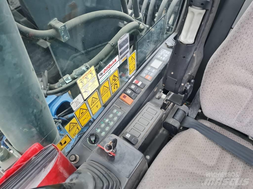 CAT M315D 2 buckets Gravemaskiner på hjul