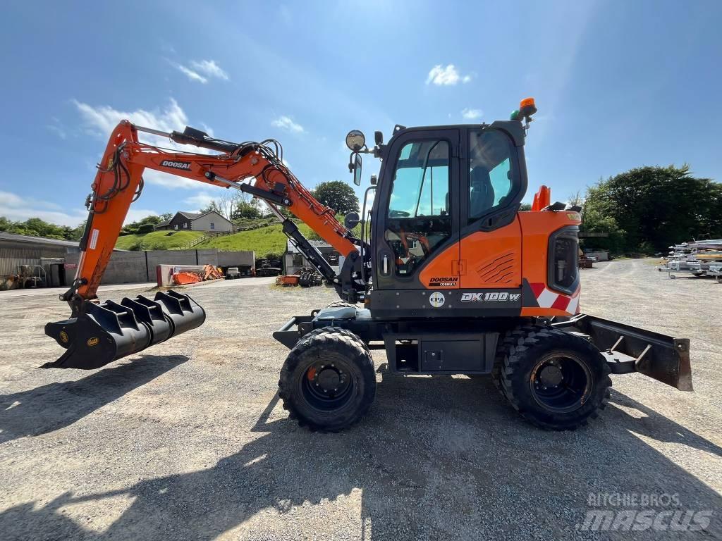 Develon DX 100 W-7 Gravemaskiner på hjul